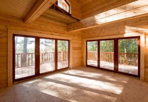 Панорамные окна для деревянного дома: за или против